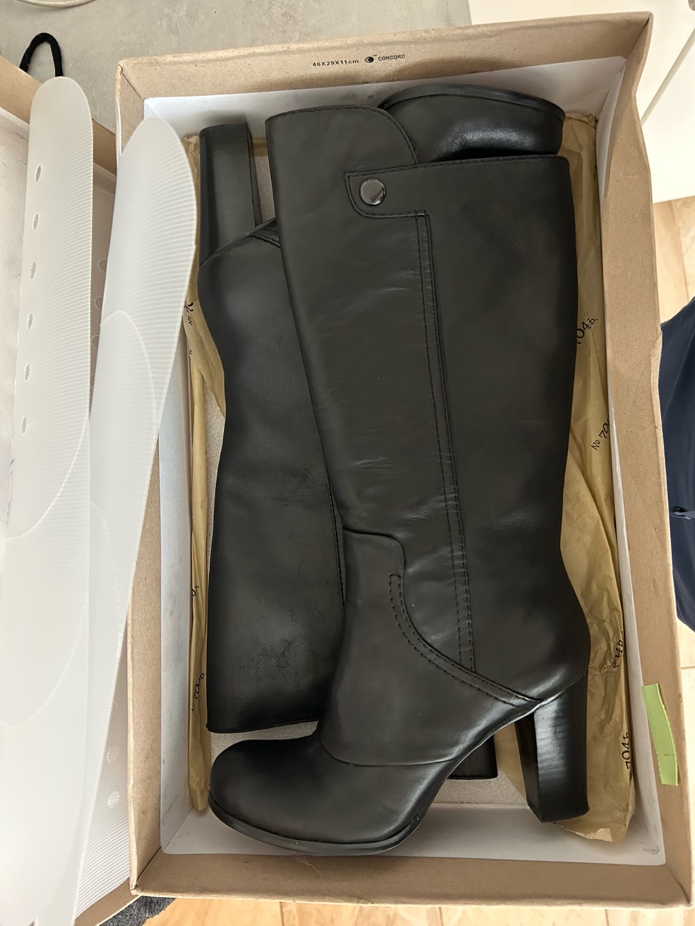 black heeled leather boots